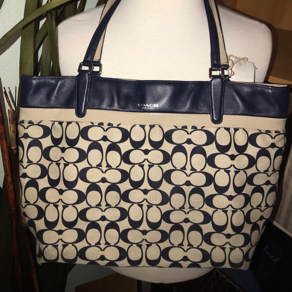 Navy blue and canvas coach tote.